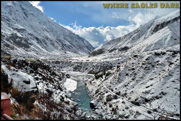 The majestic view of Badrinath Town covered with snow from Mana Village